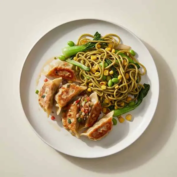 Mix Vegetable & Mushroom Dumplings with Stir- Fried Edamame, Sweet Corn & Bok Choy Noodles